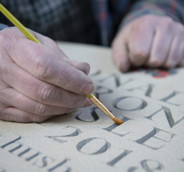 Artisan Memorials hand painting carved letters