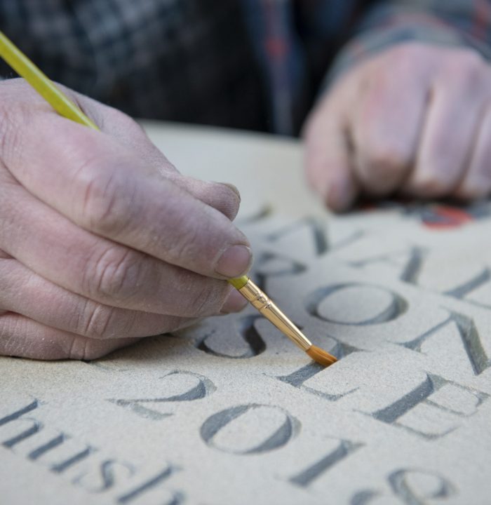 Artisan Memorials hand painting carved letters