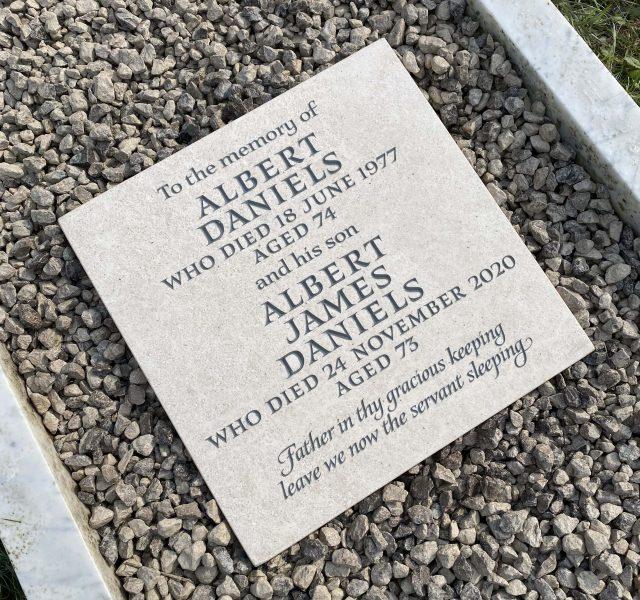 Grey Nabresina Plaque-scaled on gravel grave