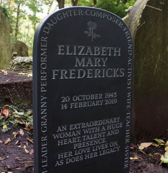 large dark grey slate grave headstone