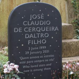a dark slate child's gravestone